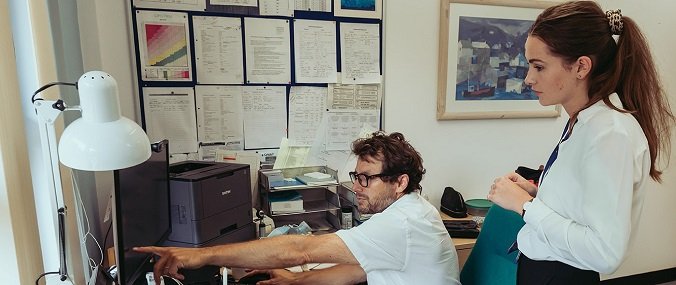 An undergraduate student watching a GP at work