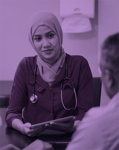 An image of a female doctor wearing a hijab with a purple filter. 